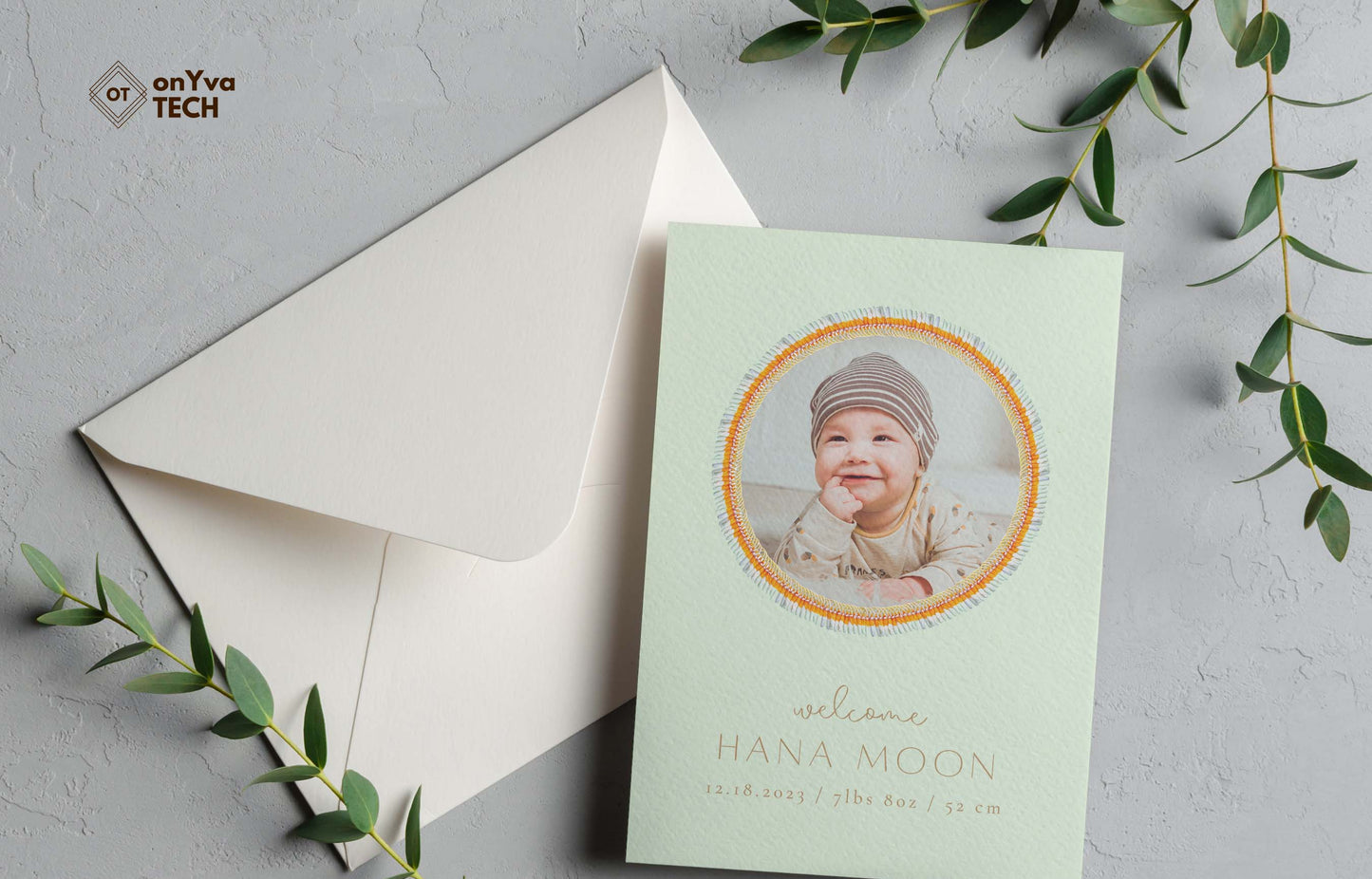 baby announcement card with a circle frame of Micronesian White Ginger Ilima Lei necklace around the picture.