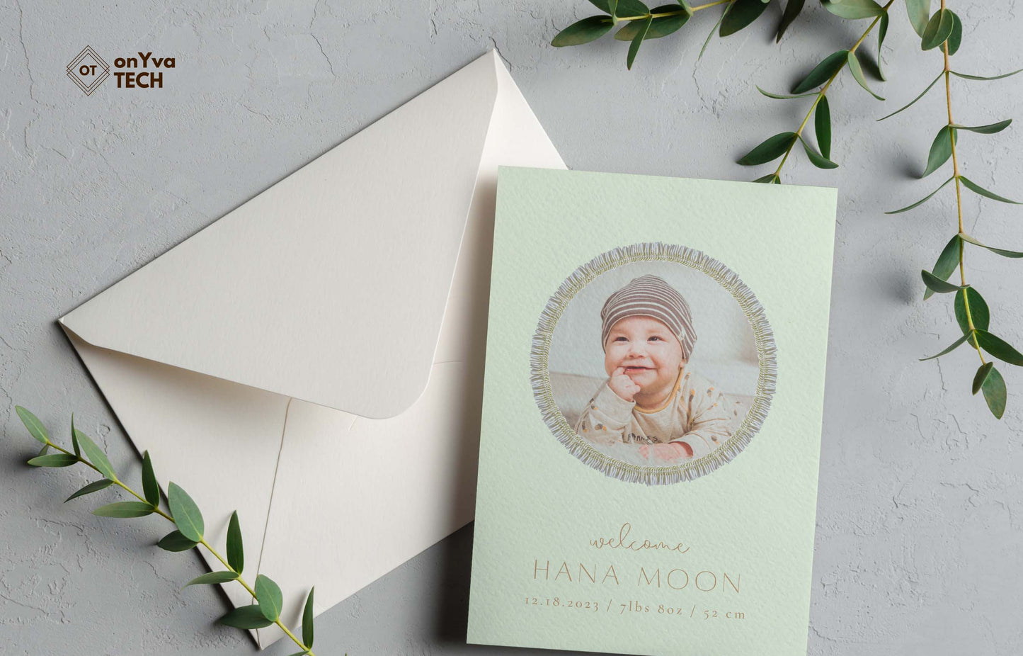 baby announcement card with a circle frame of Micronesian White Ginger Lei necklace around the picture.