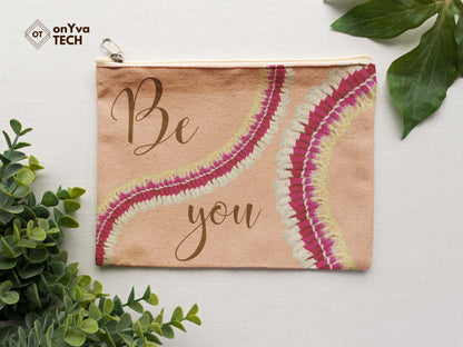  burlap pouch for gifts with the sublimation print of squiggly Micronesian Ginger Orchid Lei flower PNG and the words Be You